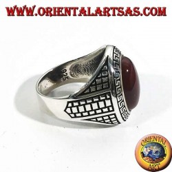 Silver ring with large oval carnelian surrounded by a Greek relief