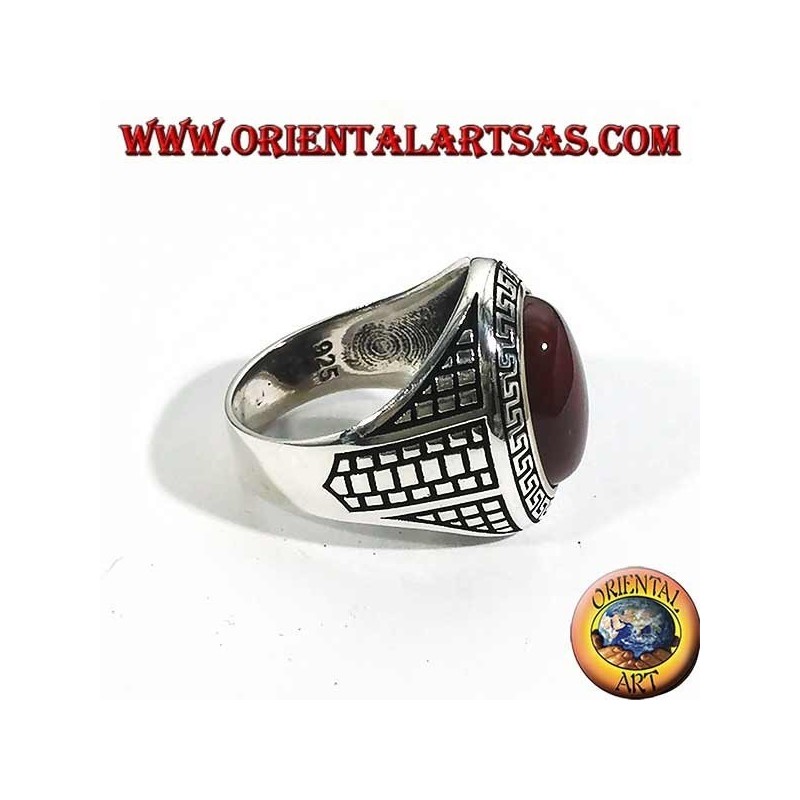 Silver ring with large oval carnelian surrounded by a Greek relief