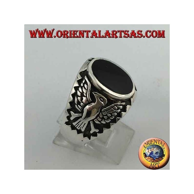 Silver ring with oval onyx and federal eagle in bas-relief on the sides