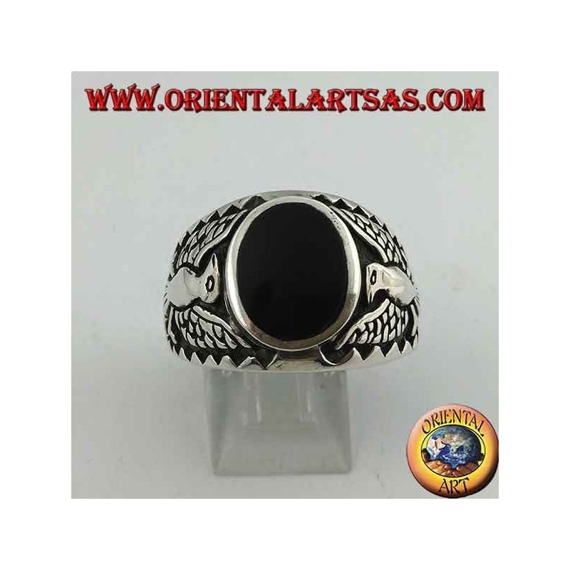 Silver ring with oval onyx and federal eagle in bas-relief on the sides