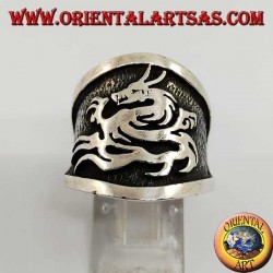 Wide band silver ring with dragon in high relief