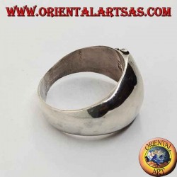 Silver ring with a convex band on the front with a curved line of dots