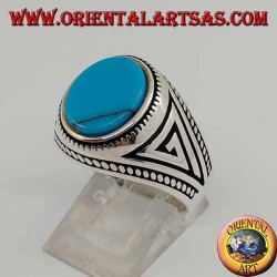 Bague en argent avec turquoise ovale plate avec tresse sur les bords de la bague