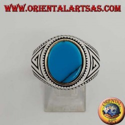 Silver ring with flat oval turquoise with braid at the edges of the ring