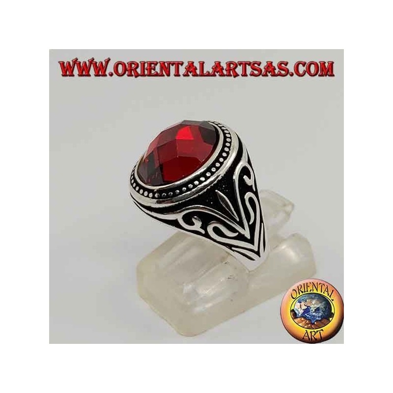 Silver ring with cabochon faceted synthetic garnet with side decorations