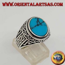 Silver ring with flat oval turquoise with Greek on the sides of the ring