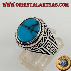 Bague en argent avec turquoise ovale plate avec grecque sur les côtés de la bague