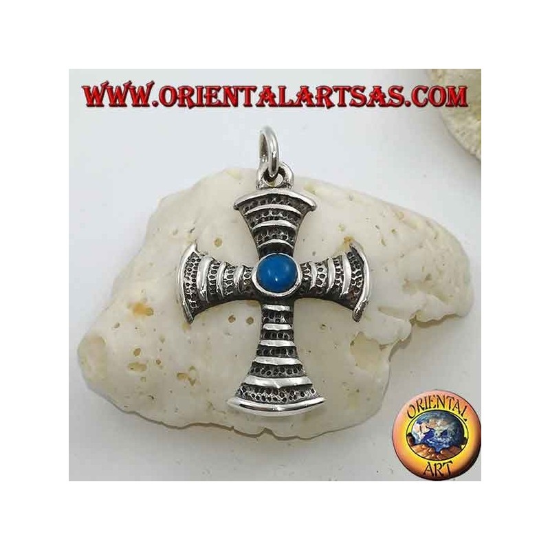 Cross-shaped silver pendant with central round turquoise