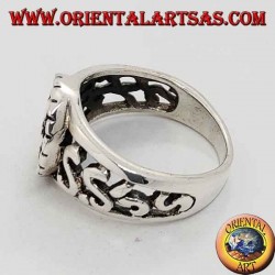 Silver ring with Greek cross in high relief and perforated decorations on the sides