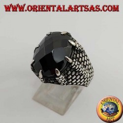 Silver ring with oval faceted onyx set by the claws