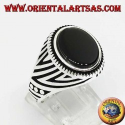 Silver ring with flat oval onyx and engravings engraved on the sides