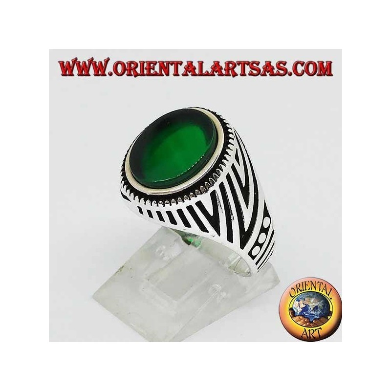 Silver ring with flat oval green agate and engravings engraved on the sides