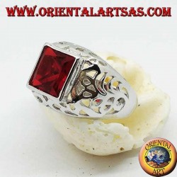 Silver ring with garnet-colored square zircon perforated on the sides