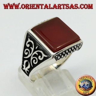Silver ring with flat square carnelian and Florentine decorations on the sides
