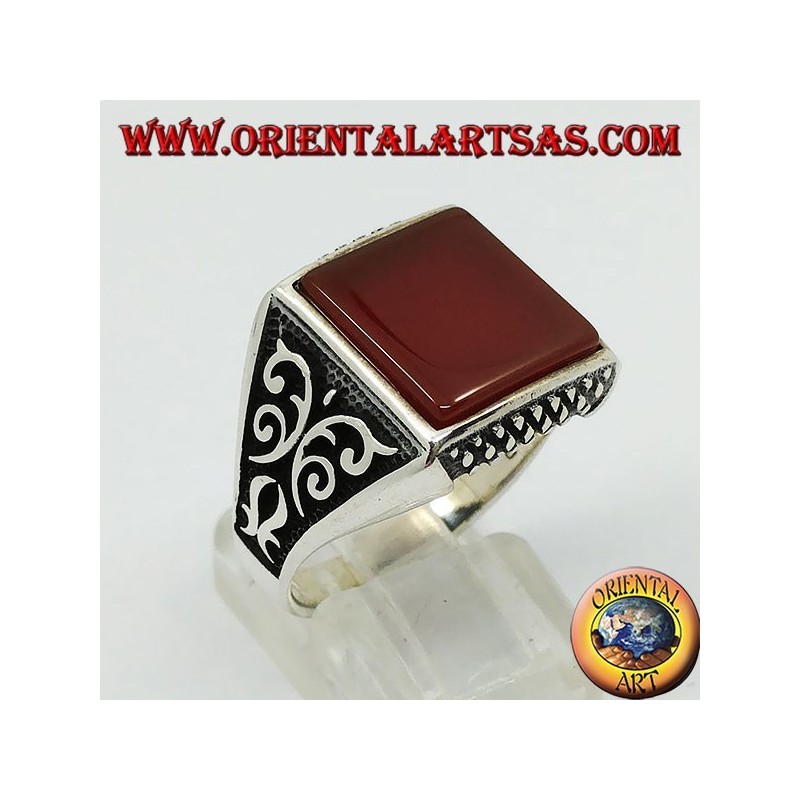 Silver ring with flat square carnelian and Florentine decorations on the sides