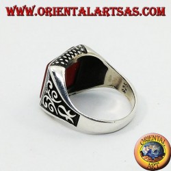 Silver ring with flat square carnelian and Florentine decorations on the sides