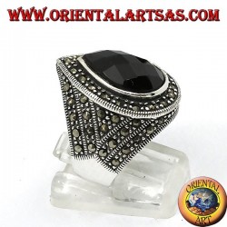 Silver ring with faceted teardrop onyx surrounded by marcasite