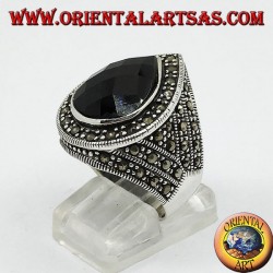 Silver ring with faceted teardrop onyx surrounded by marcasite