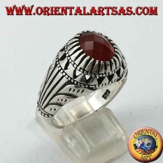 Silver ring with oval carnelian set and carvings on the sides