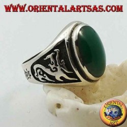 Silver ring with oval green agate and dragon in high relief on the sides