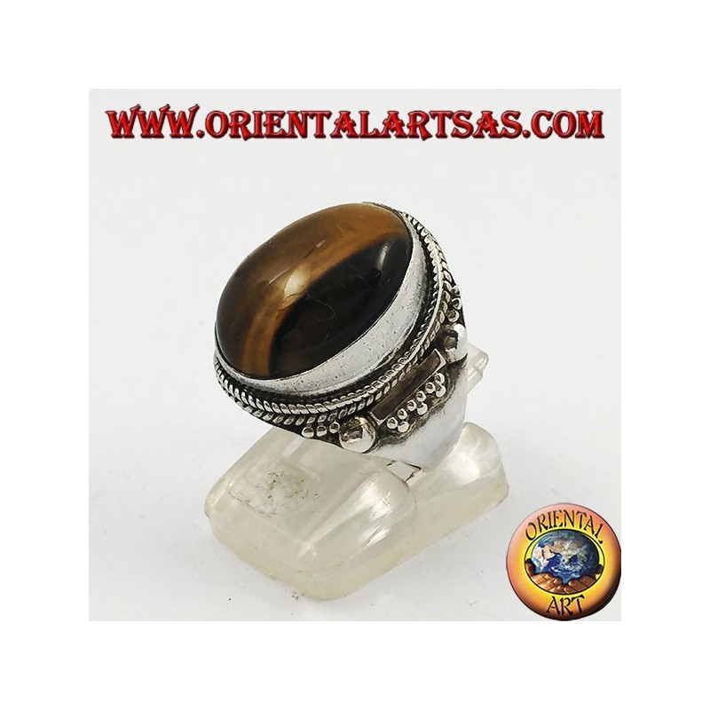 Bague en argent avec cabochon ovale oeil de tigre et décorations indiennes