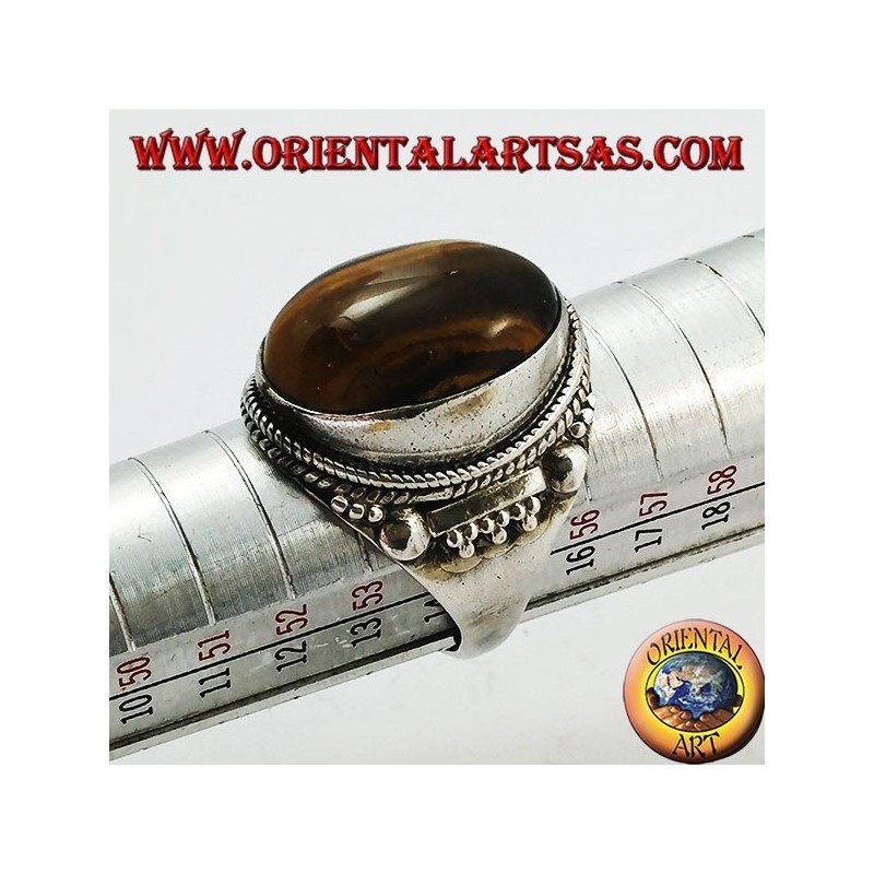Silberring mit ovalem Cabochon-Tigerauge und indischen Verzierungen