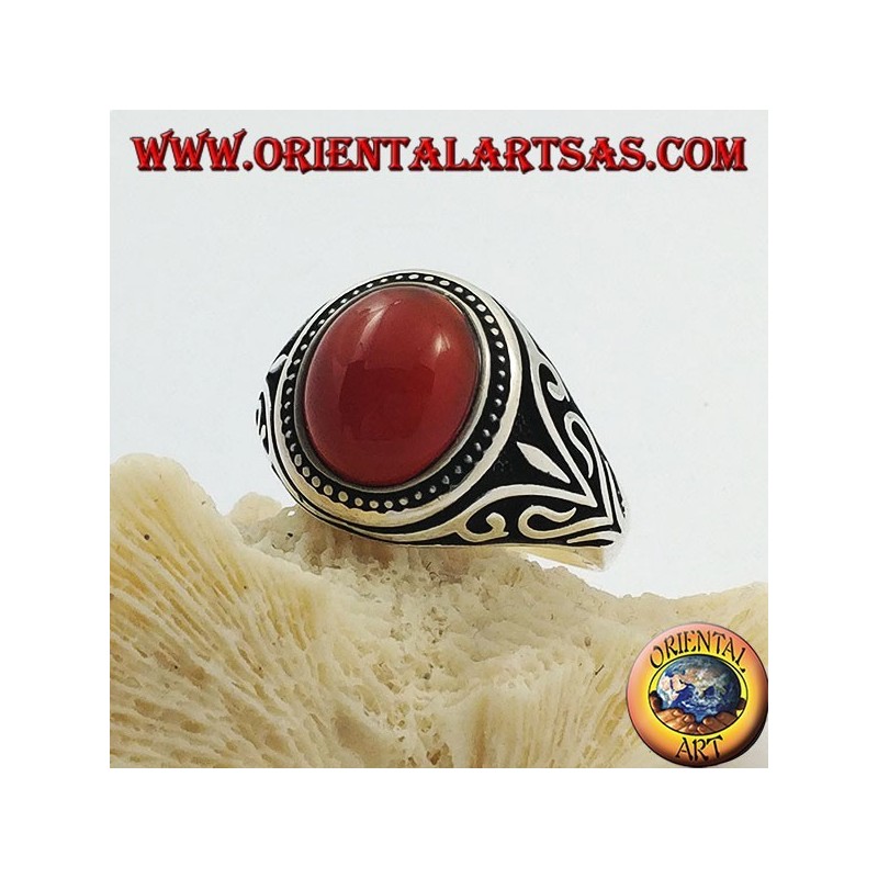 Silver ring with oval cabochon carnelian with side decorations