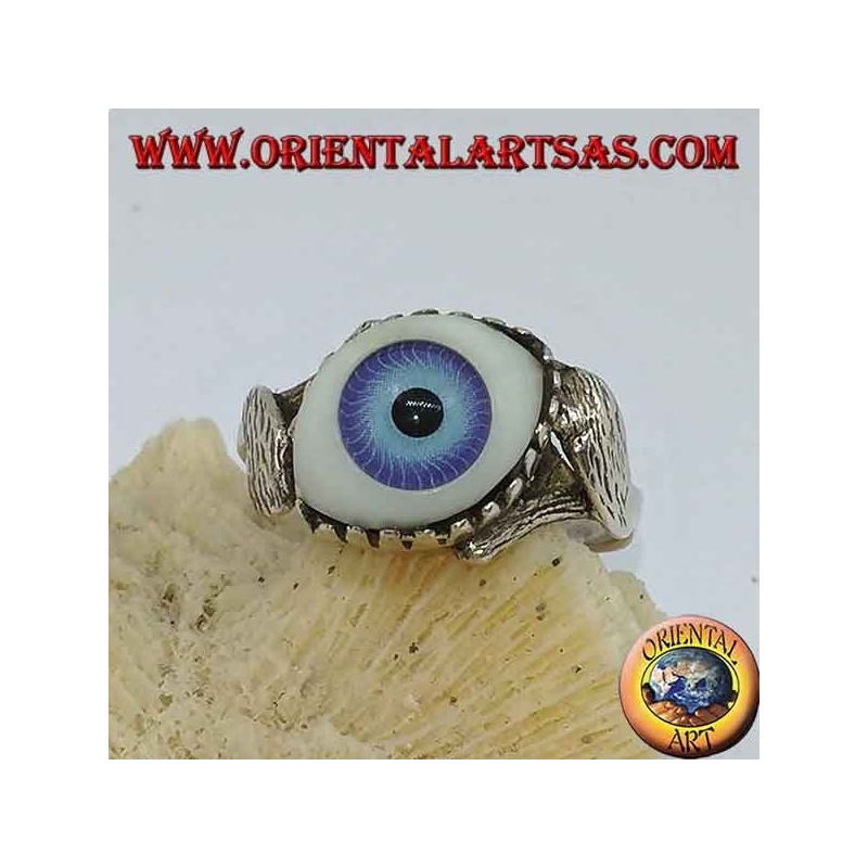 Silver ring with blue eye diagonally between two leaves