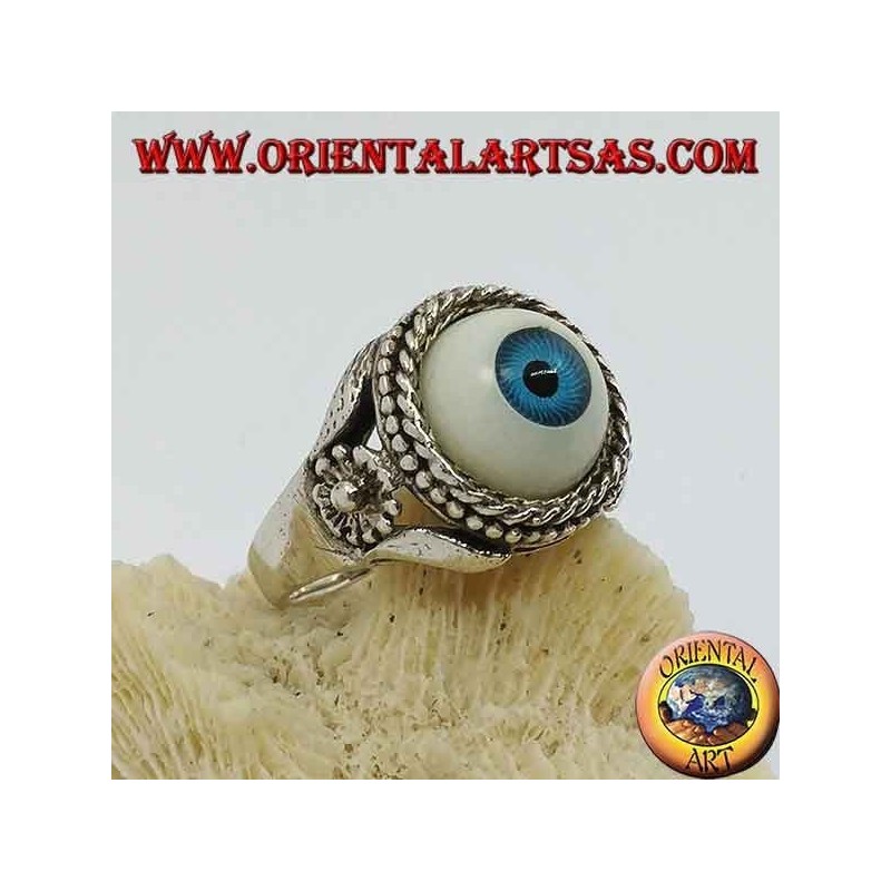 Silver ring with large blue eye and flower on the sides
