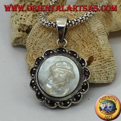 Silver cameo pendant on mother of pearl surrounded by silver and garnet flower