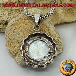 Silver cameo pendant on mother of pearl surrounded by silver and garnet flower