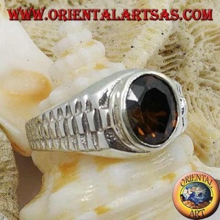 Silver ring with oval smoky topaz and clock link decoration