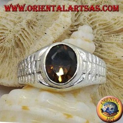 Silver ring with oval smoky topaz and clock link decoration