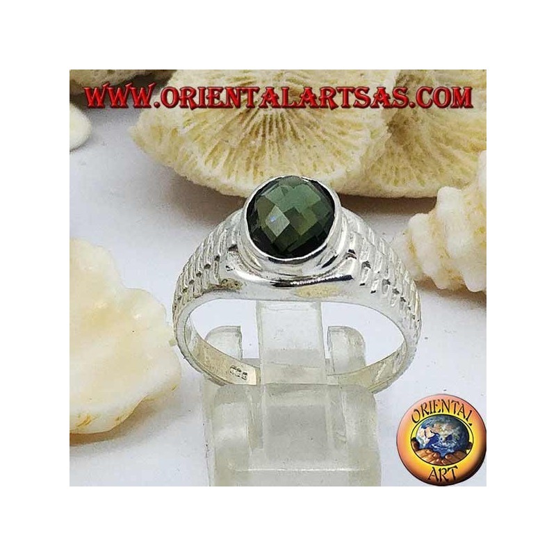 Silver ring with oval green zircon and clock link decoration