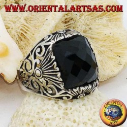 Silver ring with faceted rectangular onyx and openwork decorations
