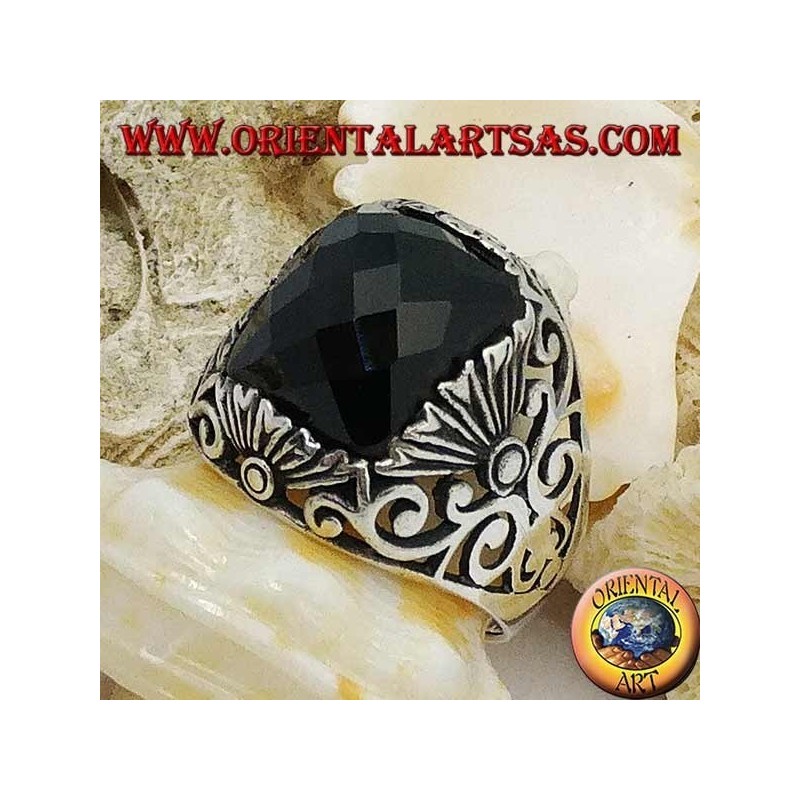 Silver ring with faceted rectangular onyx and openwork decorations