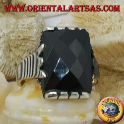 Bague en argent avec onyx rectangulaire à facettes et cadre clip