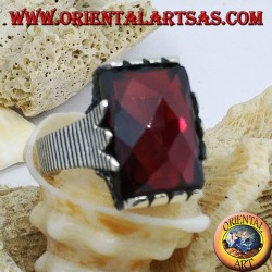 Silver ring with faceted rectangular garnet and paperclip frame