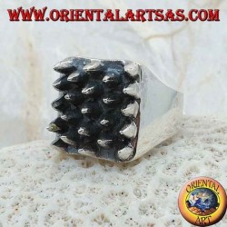 Square silver ring with spikes