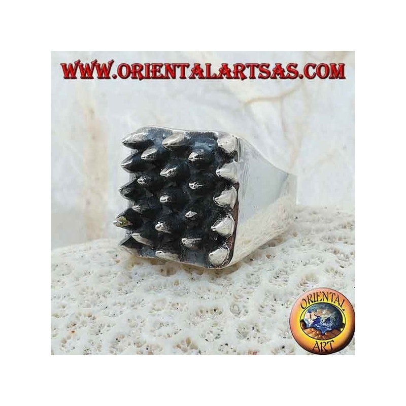 Square silver ring with spikes