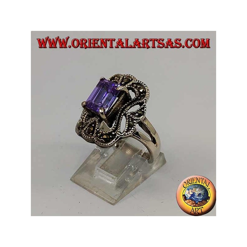 Beveled silver ring with rectangular amethyst set surrounded by marcasite