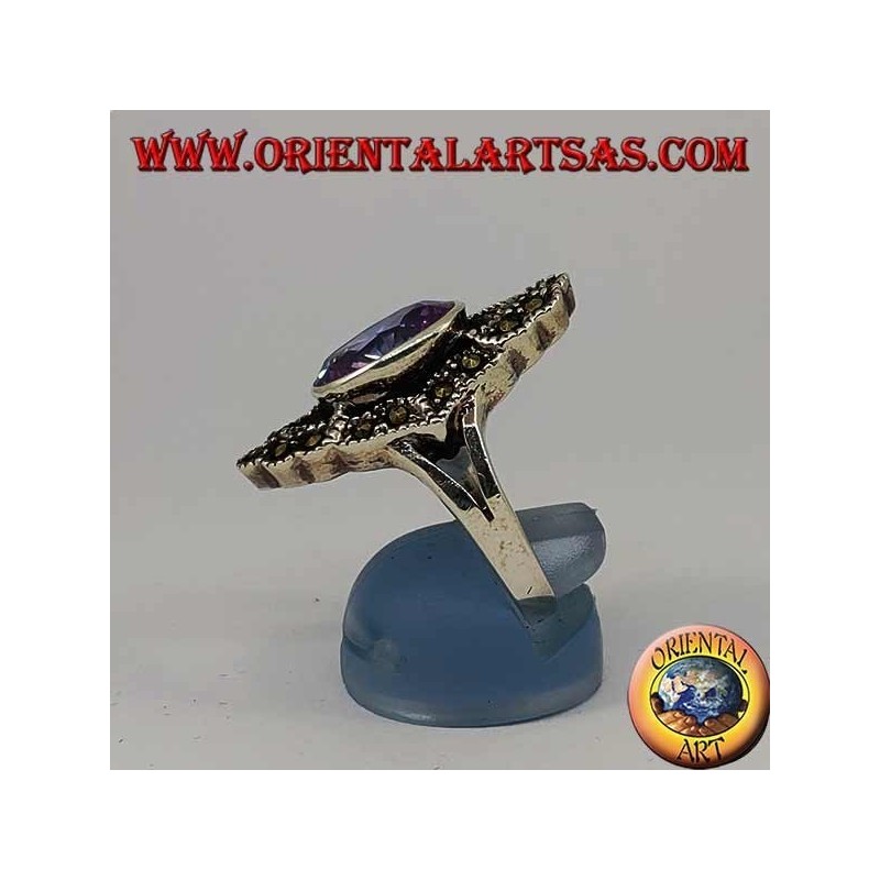 Rhomboidal silver ring with natural oval amethyst surrounded by marcasite
