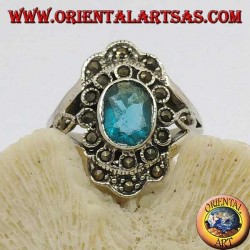 Daisy silver ring with oval blue topaz and marcasite