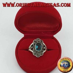 Anillo de plata margarita con topacio azul ovalado y marcasita