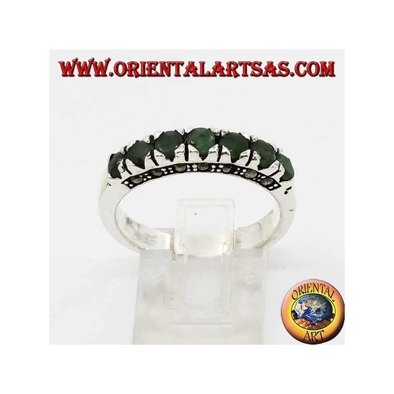 Band silver ring with a row of round emeralds set and marcasite