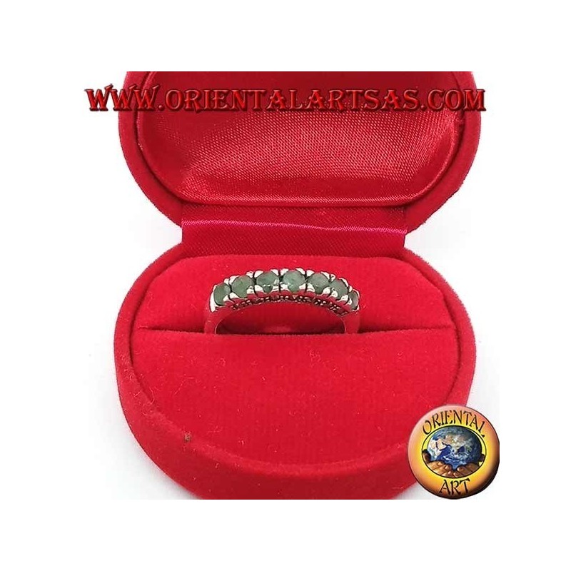 Band silver ring with a row of round emeralds set and marcasite