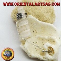 Silver ear cuff earring with chain, dotted with tortoises in relief