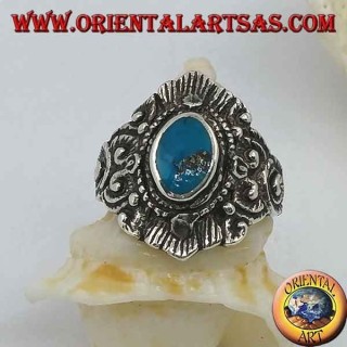 Bague en argent avec des décorations ovales turquoise et népalaises