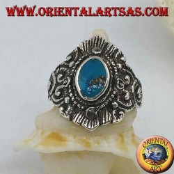 Silver ring with oval turquoise and Nepalese-style decorations