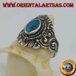 Silver ring with oval turquoise and Nepalese-style decorations